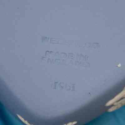 Bottom of dish: Bottom of the blue dish with "Wedgwood; Made in England; 1961."