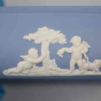 Wedgwood Jasperware square dish: The blue Wedgwood Jasperware dish features white angel scenes with a tree and small animals.