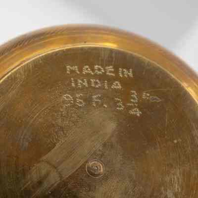 Engraving in bottom of bowl: "Made in India; 96F34."