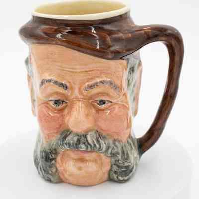 Sir John Falstaff stein: The handpainted stein features Sir John Falstaff's detailed face and a sturdy handle.