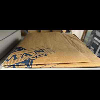 Pullman-branded paper bags.
