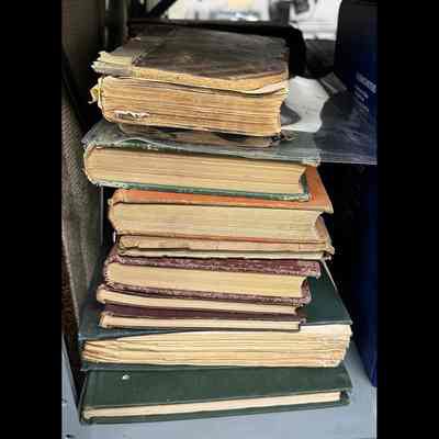 Stack of books; varying conditions.