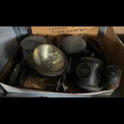 Box of various lights and light housings.