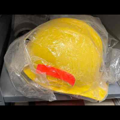 Hard hat, yellow in color.
