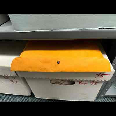 Manila envelope with papers.