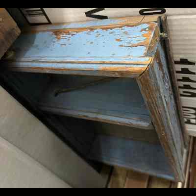 Small shelf box, wooden, painted blue in color.
