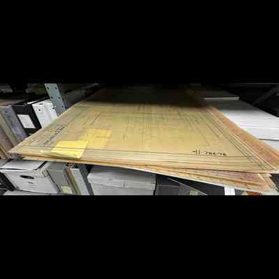 Engineering drawings on thick vellum.