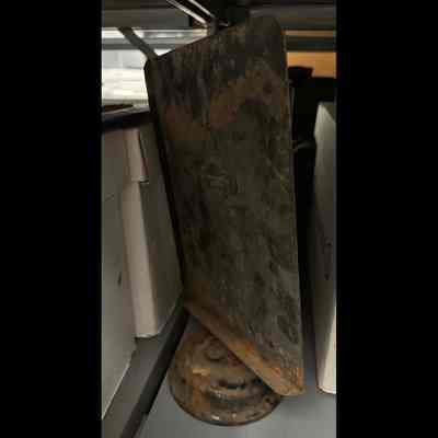 Metal artifact (copy stand?).