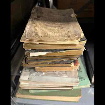 Stack of books; varying conditions.