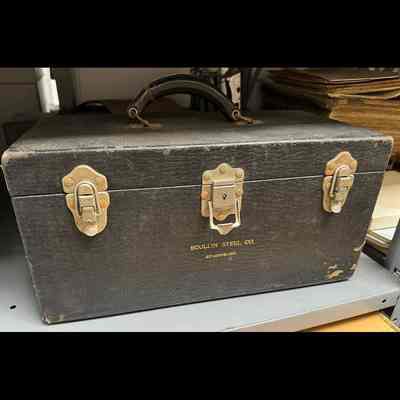 Labeled in gold lettering “Scullin Steel Co. St. Louis Mo.”