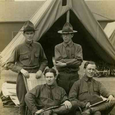 Four Soldiers in front of tent. Ft. Warren, MA