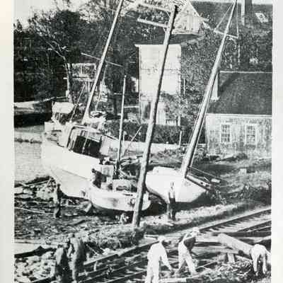 Fishing Boats thrown ashore at Woods Hole, Cape Cod MA
