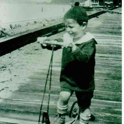 Child on scooter at Alki