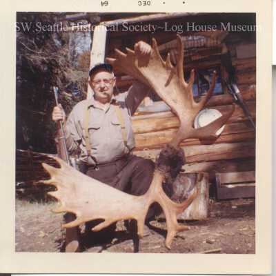Omar Schari with Moose Horns and Rifle