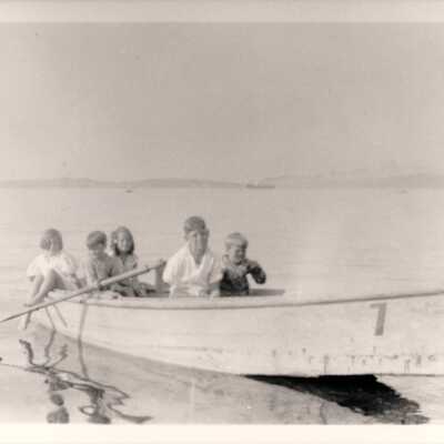 Alki Boat House rowboat with five children