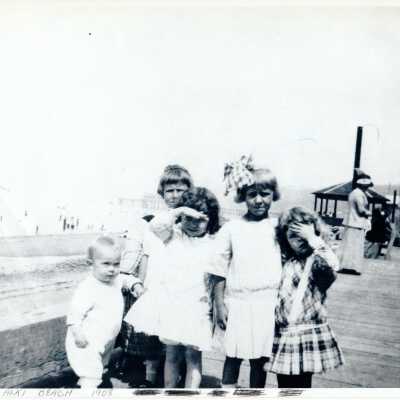 Five children on Alki boardwalk in 1908.