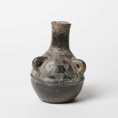 Small pitcher with Stars of David, and Statuette