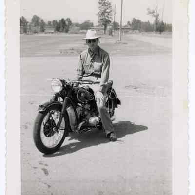 Photograph of Bill Davis on his motorcycle, undated