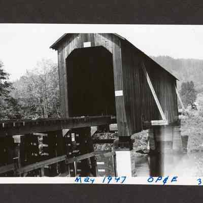 Photograph of OP&E covered wooden bridge in unknown location