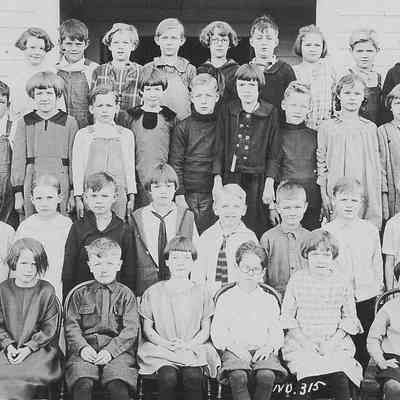 Photograph of students posed outside school, Springfield, Oregon, date unknown