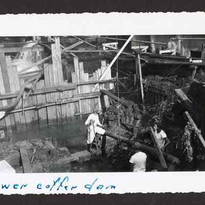 Photograph of the construction of the lower coffer dam at Booth-Kelly Lumber Mill