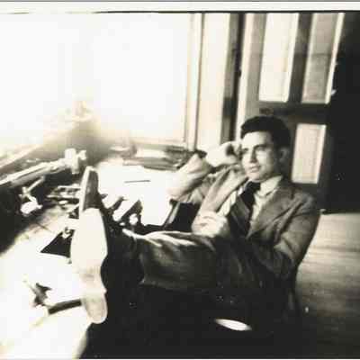 Photograph of Karl Dannen at Telegraph Desk, Early 1940's