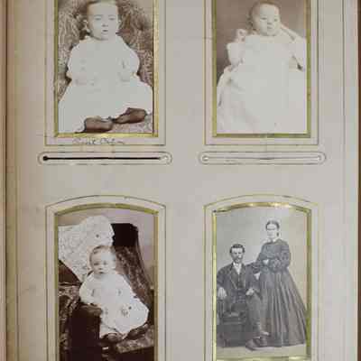 2016-024-012_img-015: Page 13 of photograph album 2016.024.012: Four photos:
1) Photo of Ernest Cation. 
2) Photo of unknown baby. 
3) Photo of  unknown baby sitting in a chair. 
4) Photo of A. Fogle and wife.