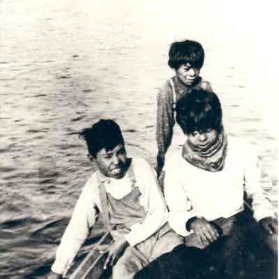 Photograph of 3 Native American Boys in a Canoe, undated