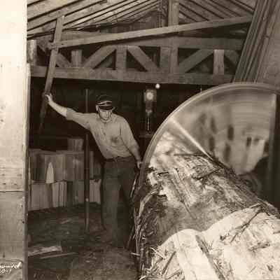 Photograph of a Trim Cutoff Saw in a Lumber Mill, Unknown date and location
