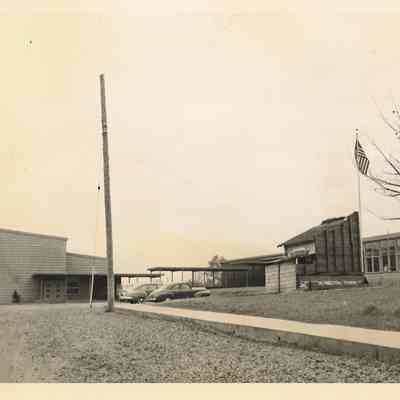 Photograph of a school building, 1940s