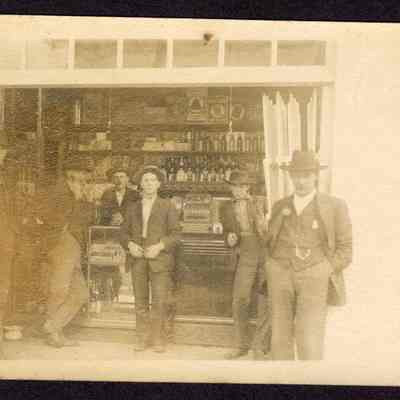 Postcard, Men at a Business, Undated