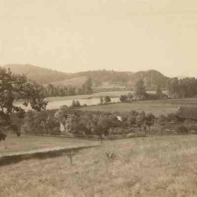 Photograph of a Farm taken from a hill, date unknown