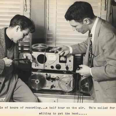 Photograph of two men editing tapes at K.O.R.E., Eugene, Oregon, circa 1945-1951