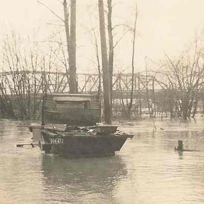 Photograph of the flooding river, taken at the Willamette River, Springfield, Oregon, 1943