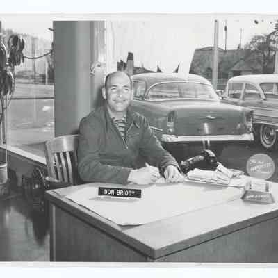 Photograph of Don Briody at Springfield Motors, 1959
