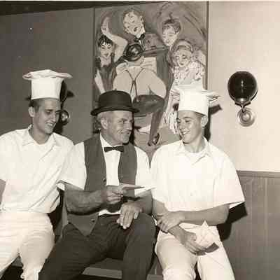 Photograph of Norman Kolln and two unknown men at Pietro's Pizza, Eugene Oregon