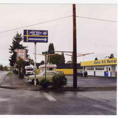 Photograph of Main St and "Alpine Import Service", Springfield, 1998
