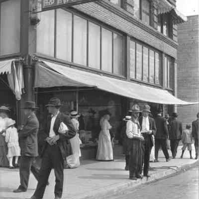 Photograph of a drug store, Sutton Block on Main Street, Springfield, Oregon, circa 1914-1920