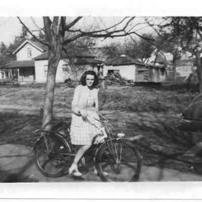 Photograph of Jeanne Daniels with Bicycle, Undated
