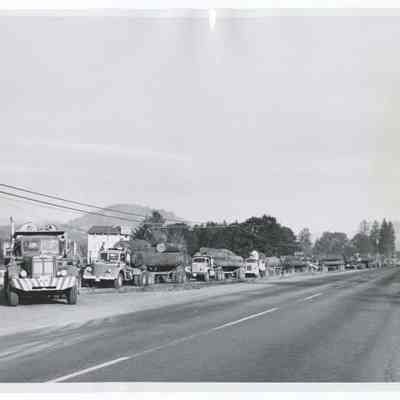 Photograph of logging trucks, Oregon
