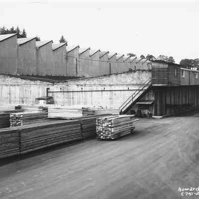 Photograph of Stacked Lumber at Booth Kelly Mill, Date Unknown