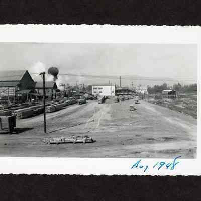 Photograph of filling of old log pond at Booth-Kelly Lumber Mill, Springfield, Oregon, 1948