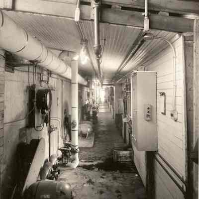 Photograph of industrial hallway, undated
