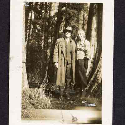 Photograph of a man and a woman on a nature walk, undated
