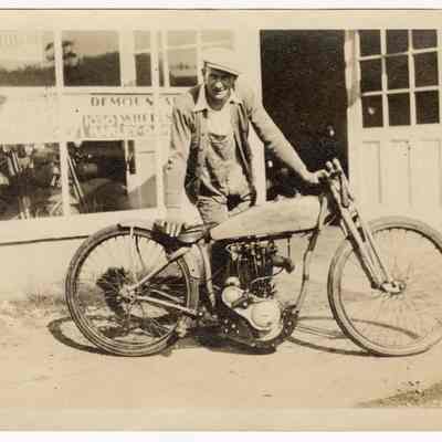Photograph of Bill Davis and his motorcycle, 1921
