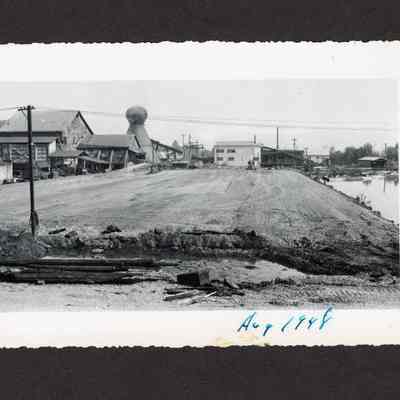 Photograph of the filling of the old log pond area at Booth-Kelly Lumber Mill, Springfield, Oregon, 1948