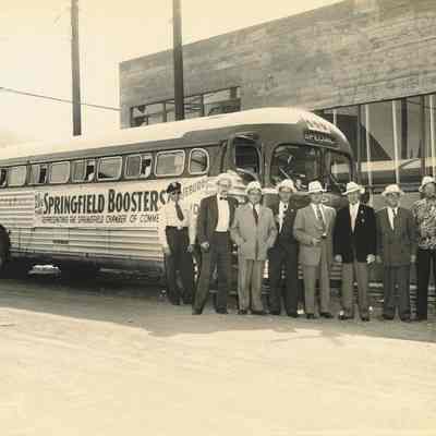 Photograph of Springfield Chamber of Commerce booster bus and members, Springfield, Oregon, date unknown.