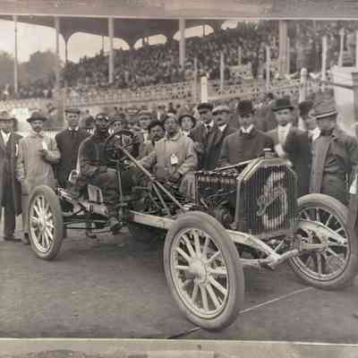 Photograph of Otto E. Scherer and David Dunbar Buick with a Buick automobile, 1909