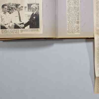 Pages 6-7 newspaper clipping unfolded