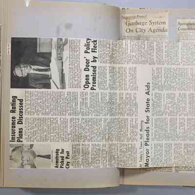 Pages 20-21 newspaper clipping unfolded
